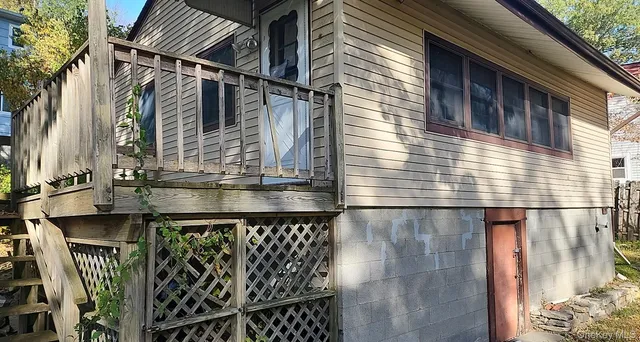 a black and white building with glass windows