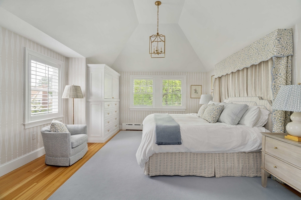 106 Florence Avenue Arlington, MA 02476 - Photo 11 of 34 a bedroom with bed and window