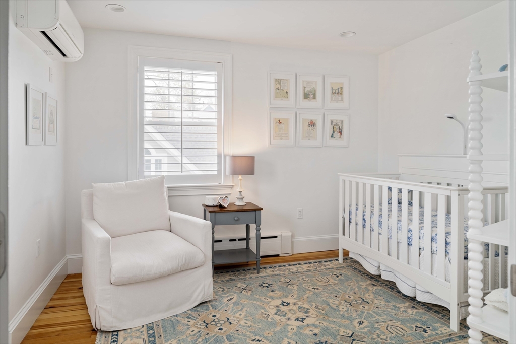 106 Florence Avenue Arlington, MA 02476 - Photo 16 of 34 a living room with furniture and a window