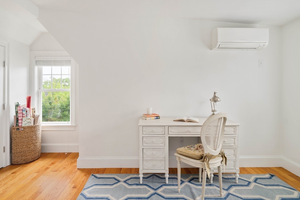 106 Florence Avenue Arlington, MA 02476 - Photo 19 of 34 a workspace with furniture and window