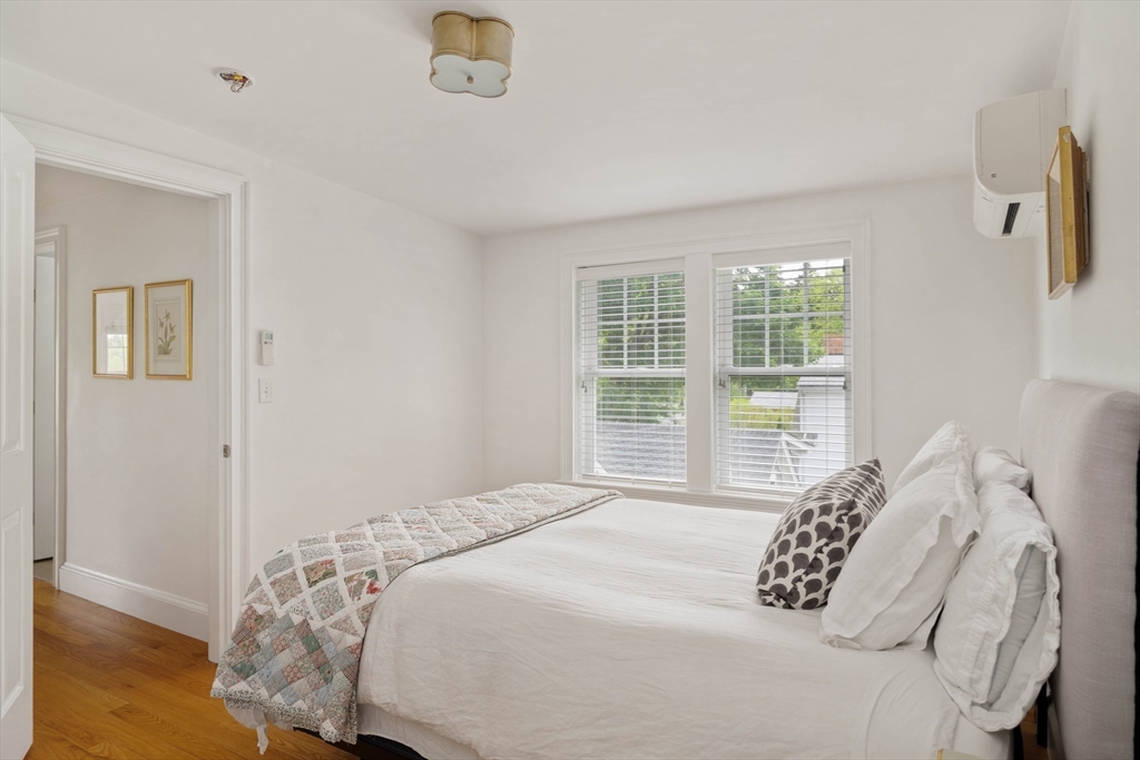 106 Florence Avenue Arlington, MA 02476 - Photo 23 of 34 a bedroom with a bed and a window