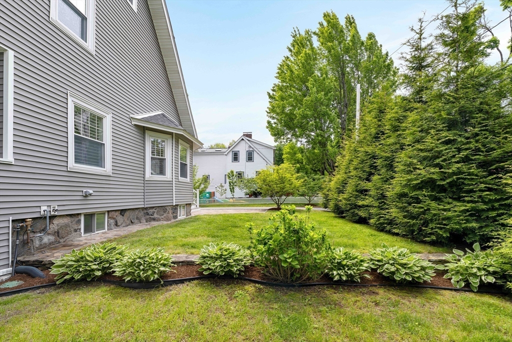 106 Florence Avenue Arlington, MA 02476 - Photo 30 of 34 a view of a house with a yard