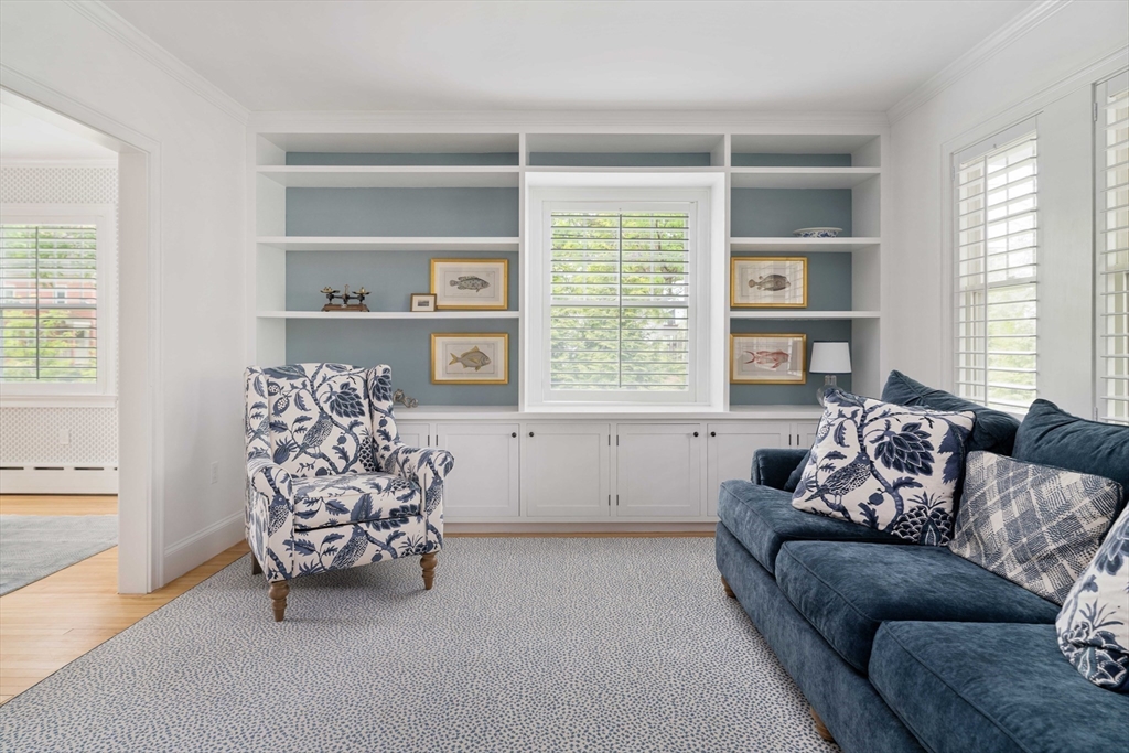 106 Florence Avenue Arlington, MA 02476 - Photo 8 of 34 a living room with furniture and a large window