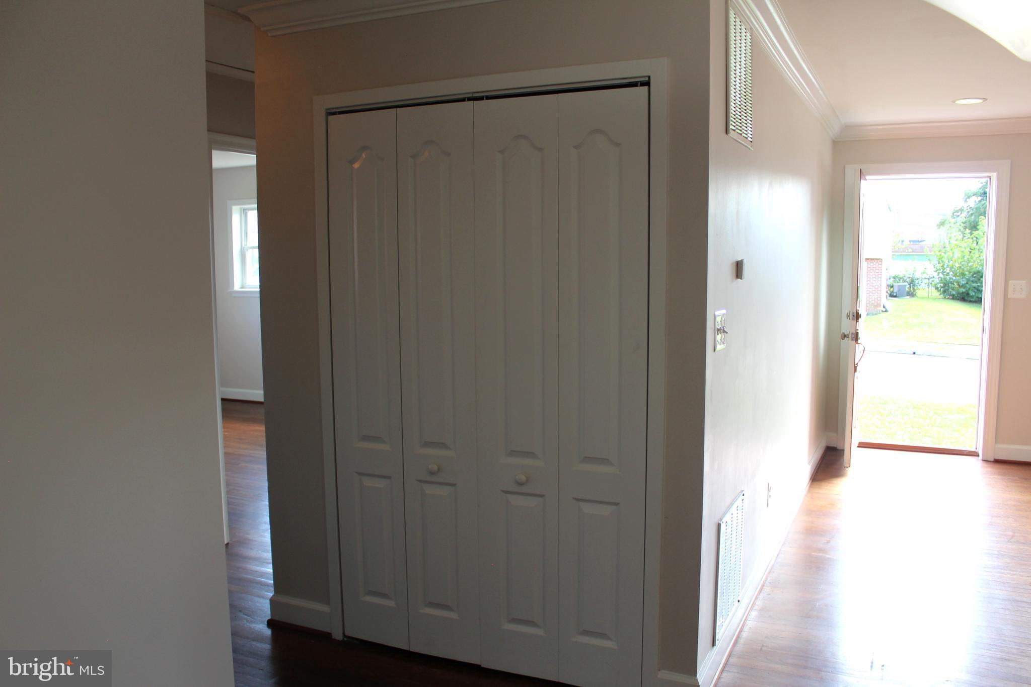 908 Vanderwood Road Catonsville, MD 21228 - Photo 15 of 36 a view of a hallway with wooden floor