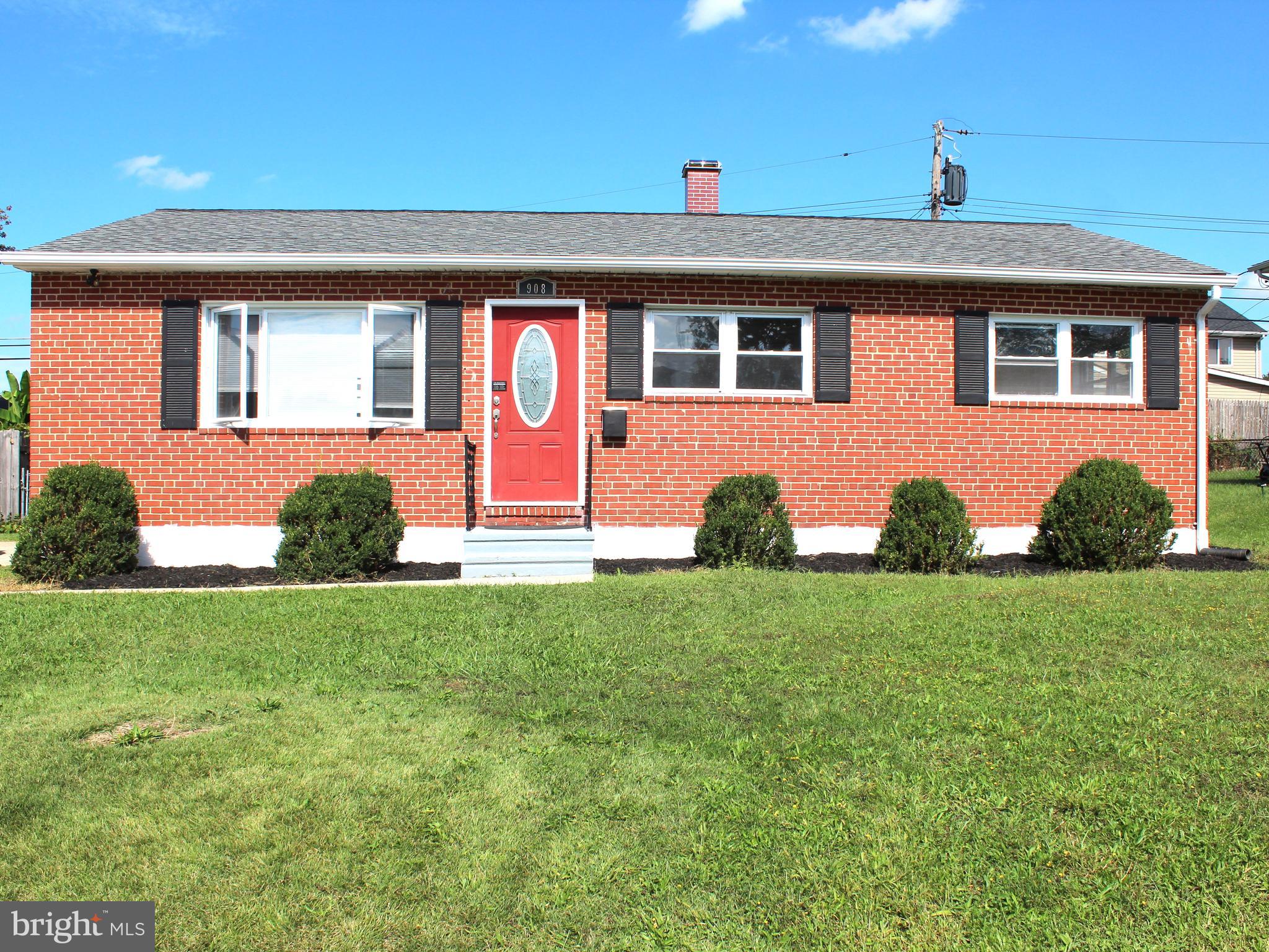 908 Vanderwood Road Catonsville, MD 21228 - Photo 2 of 36 a front view of a house with a yard
