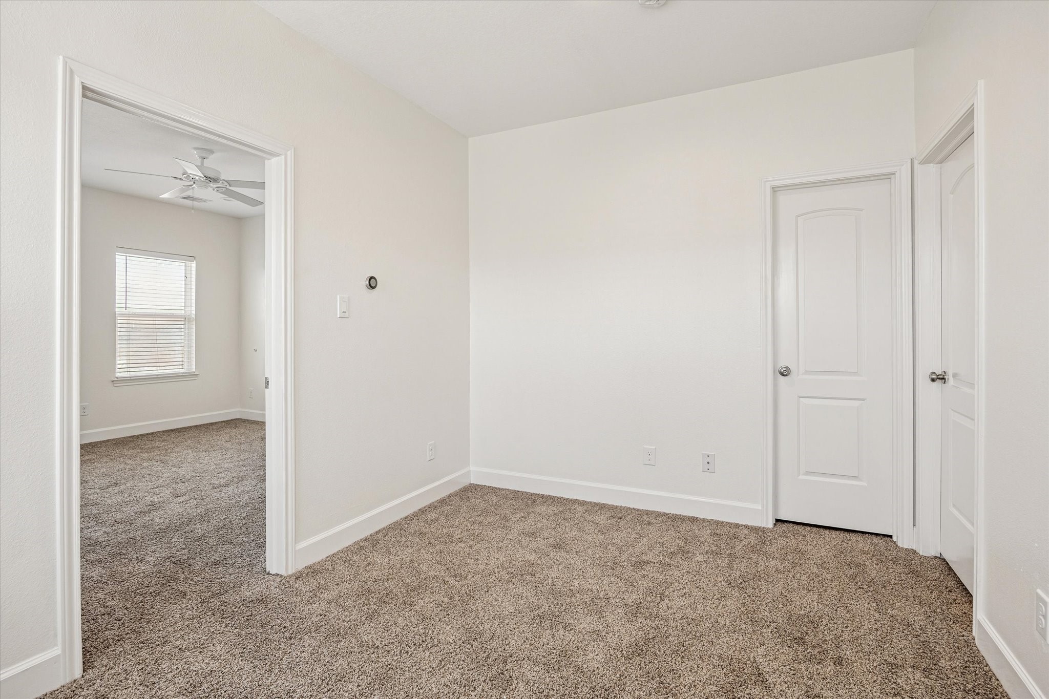 5402 Jonathan Lane Houston, TX 77011 - Photo 24 of 33 Discover the inviting third-floor secondary bedroom, seamlessly connected to a full bathroom for ultimate convenience and comfort.