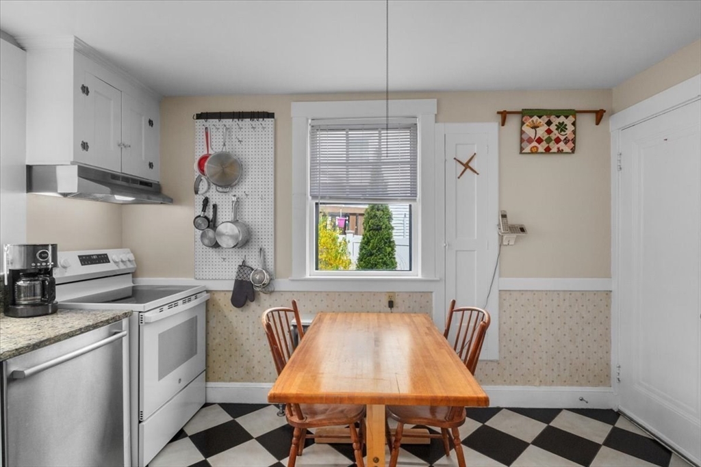 62 Washington Avenue Needham, MA 02492 - Photo 16 of 42 a view of kitchen and dining area with windows