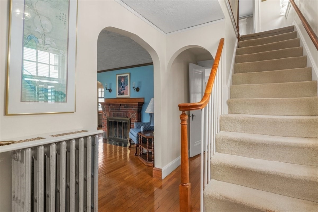 62 Washington Avenue Needham, MA 02492 - Photo 19 of 42 a view of entryway and hall with wooden floor