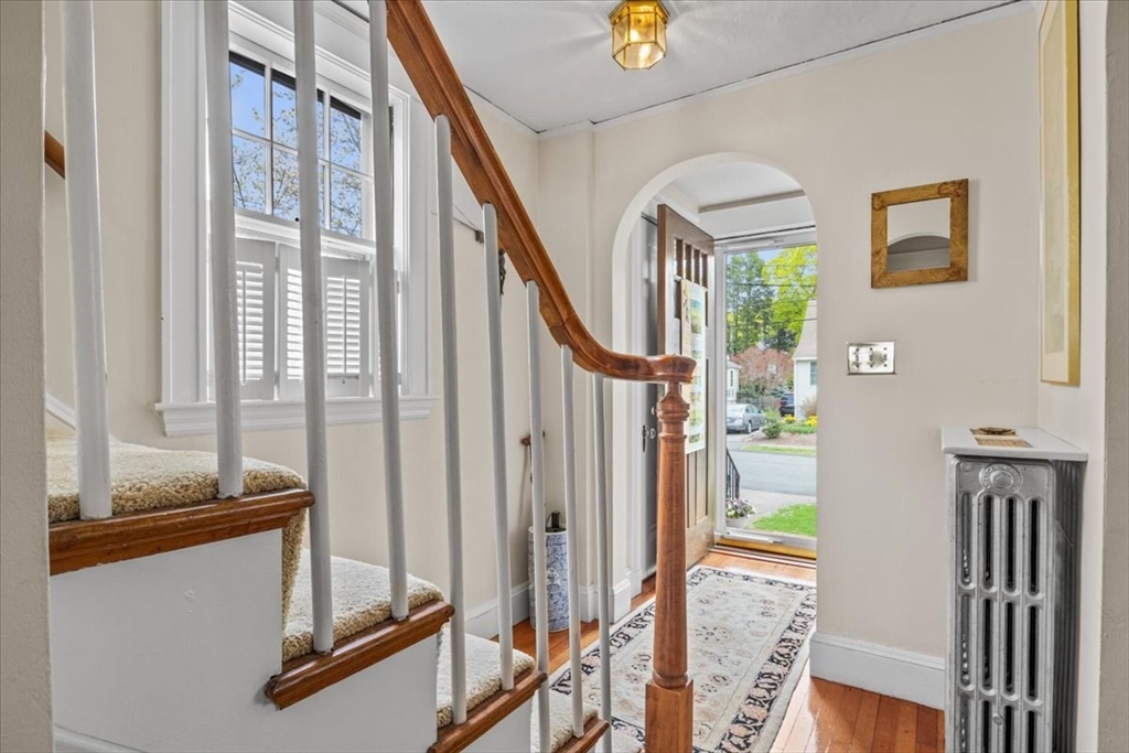 62 Washington Avenue Needham, MA 02492 - Photo 2 of 42 a view of an entryway with wooden floor
