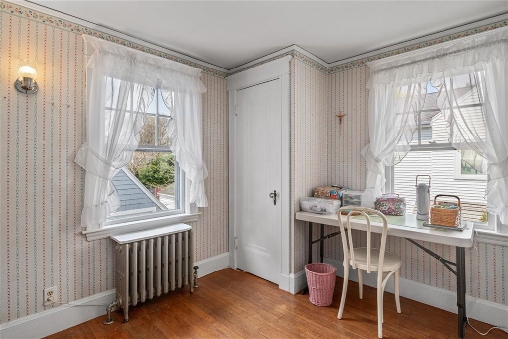 62 Washington Avenue Needham, MA 02492 - Photo 28 of 42 a view of a dining room with furniture window and wooden floor
