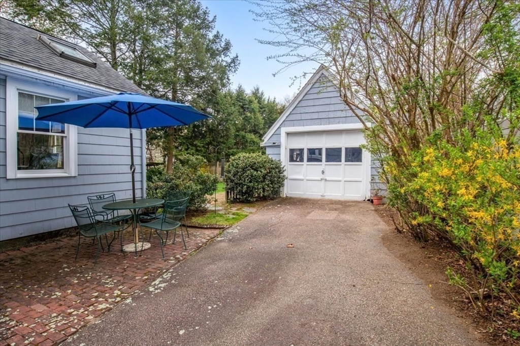 62 Washington Avenue Needham, MA 02492 - Photo 34 of 42 a view of a house with a yard and tree