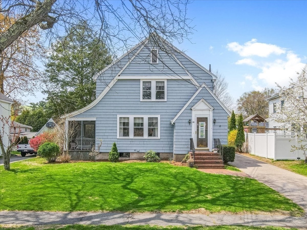 62 Washington Avenue Needham, MA 02492 - Photo 36 of 42 a front view of a house with a yard