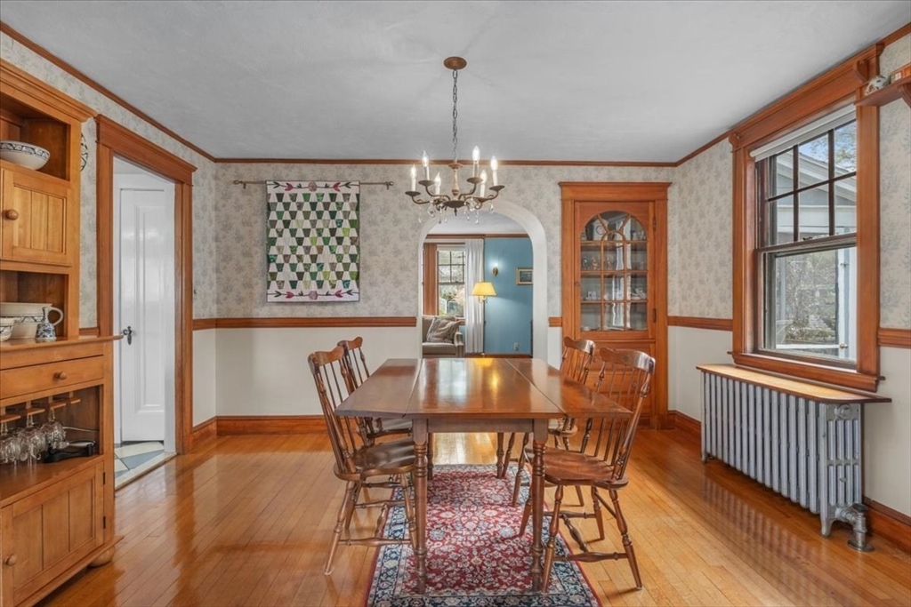 62 Washington Avenue Needham, MA 02492 - Photo 10 of 42 a view of a dining room with furniture window and wooden floor