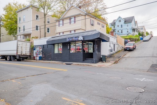 318 Congress Avenue Waterbury, CT 06708 - Photo 1 of 1 a front view of a building with street