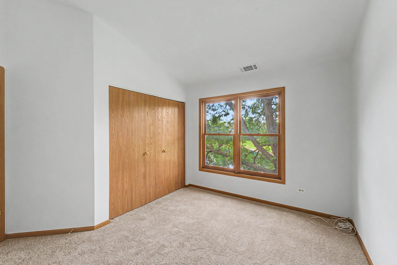 1953 North Coldspring Road Arlington Heights, IL 60004 - Photo 18 of 27 a view of an empty room with a window