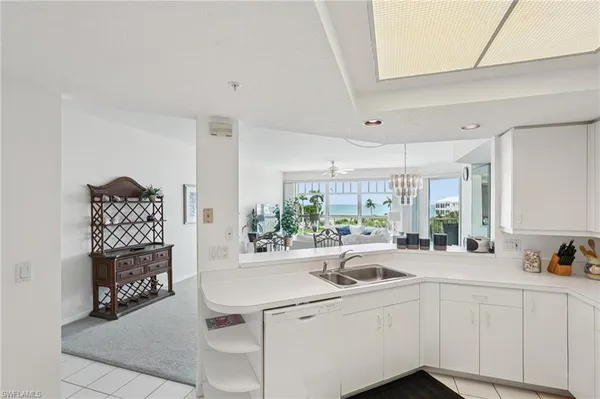 a view of living room with furniture and window
