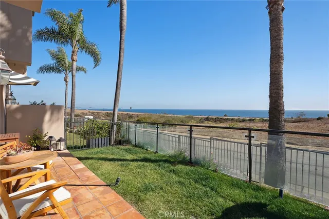 a view of a terrace with a garden