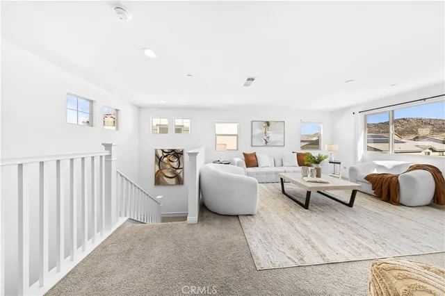 a living room with furniture and a couch