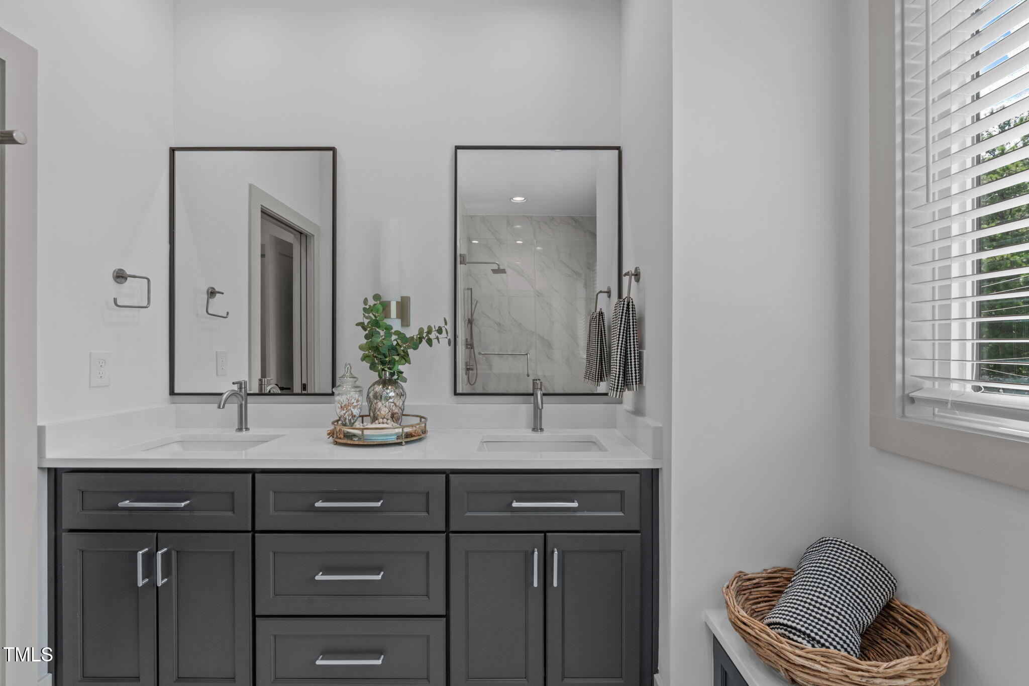 1105 Glascock Street, Unit 101 Raleigh, NC 27610 - Photo 14 of 39 a bathroom with a granite countertop sink and a mirror