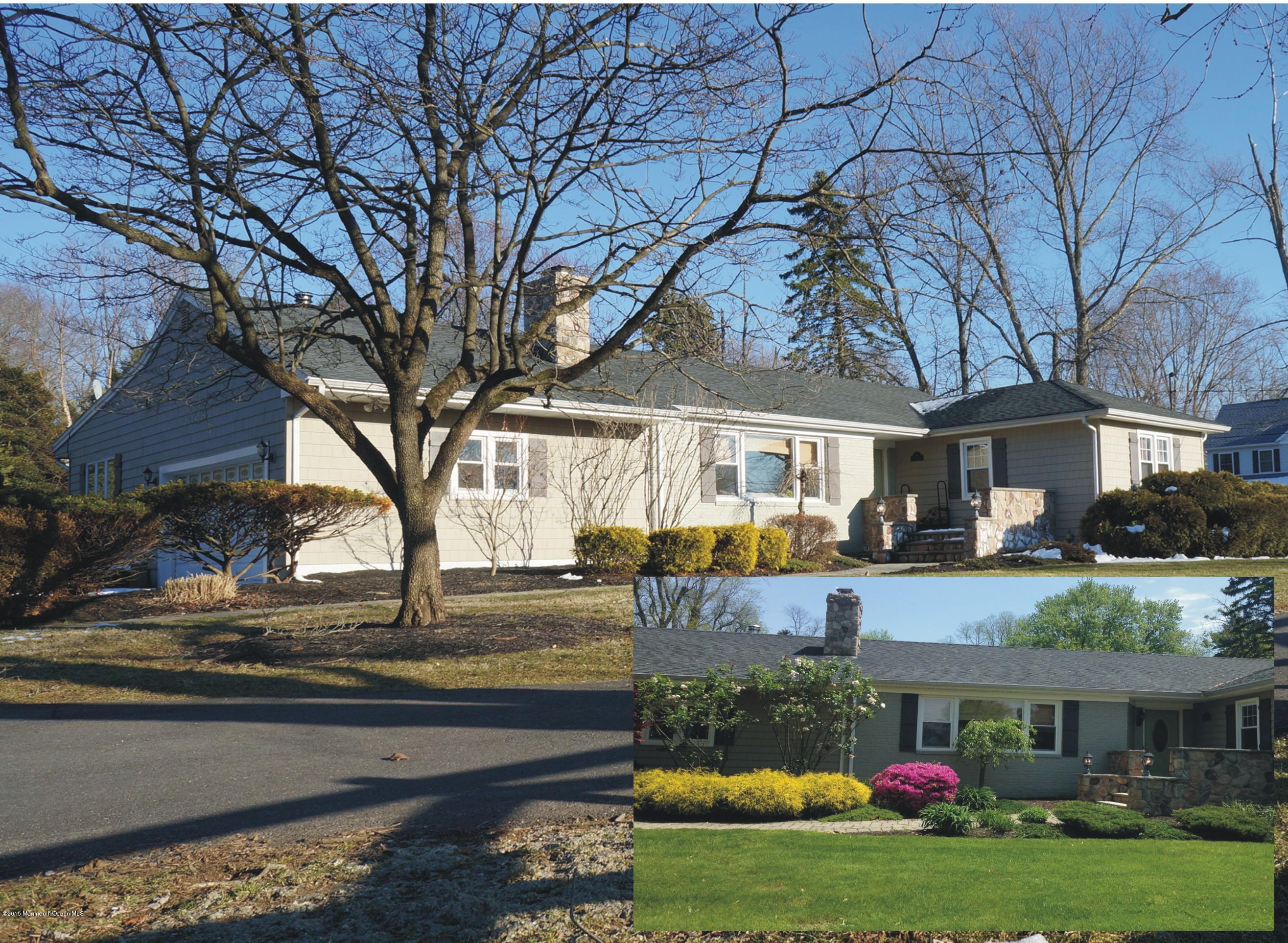 a front view of house with yard space and patio