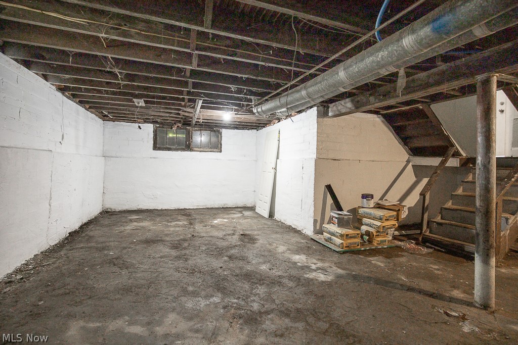 1000 Eddy Road Cleveland, OH 44108 - Photo 38 of 38 Unfinished basement with stairway