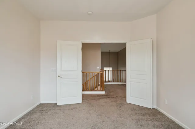 a bathroom with a double vanity sink mirror and shower