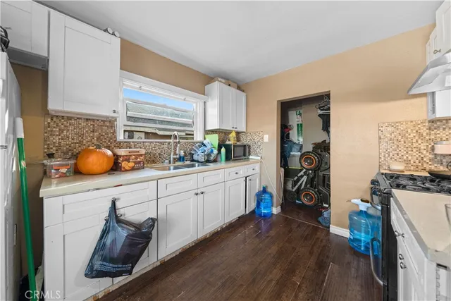 a bedroom with a bed and a closet