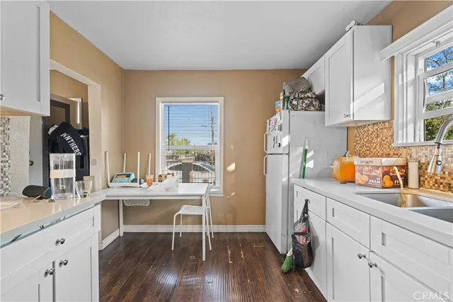 a view of a tree in a yard