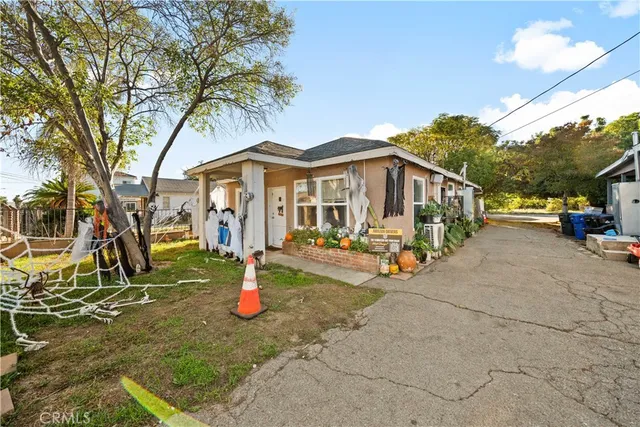 a view of a park with swings and slides
