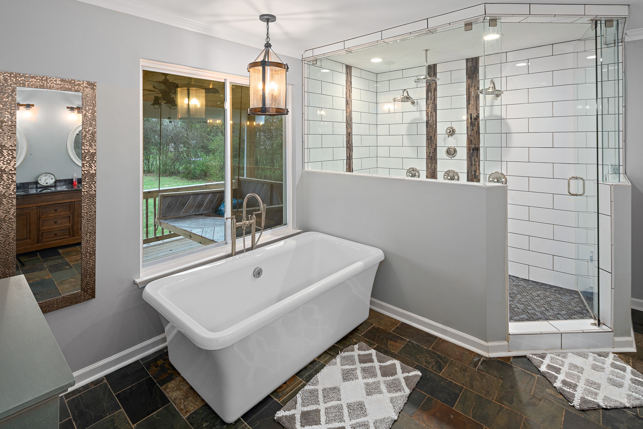 13577 Versailles Road Rockvale, TN 37153 - Photo 20 of 50 a bathroom with a sink a mirror and a shower
