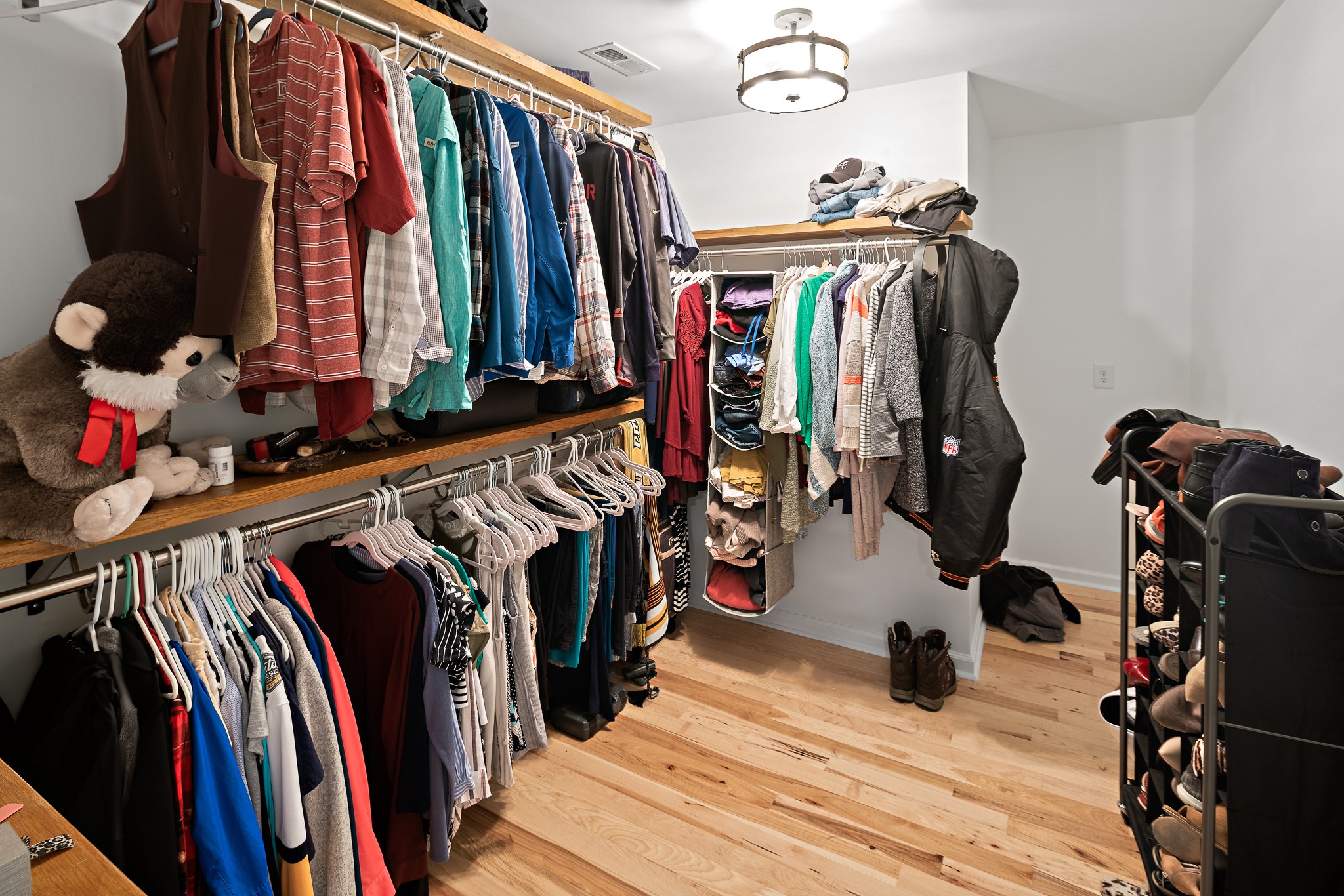 13577 Versailles Road Rockvale, TN 37153 - Photo 24 of 50 a view of walk in closet with clothes and shoes