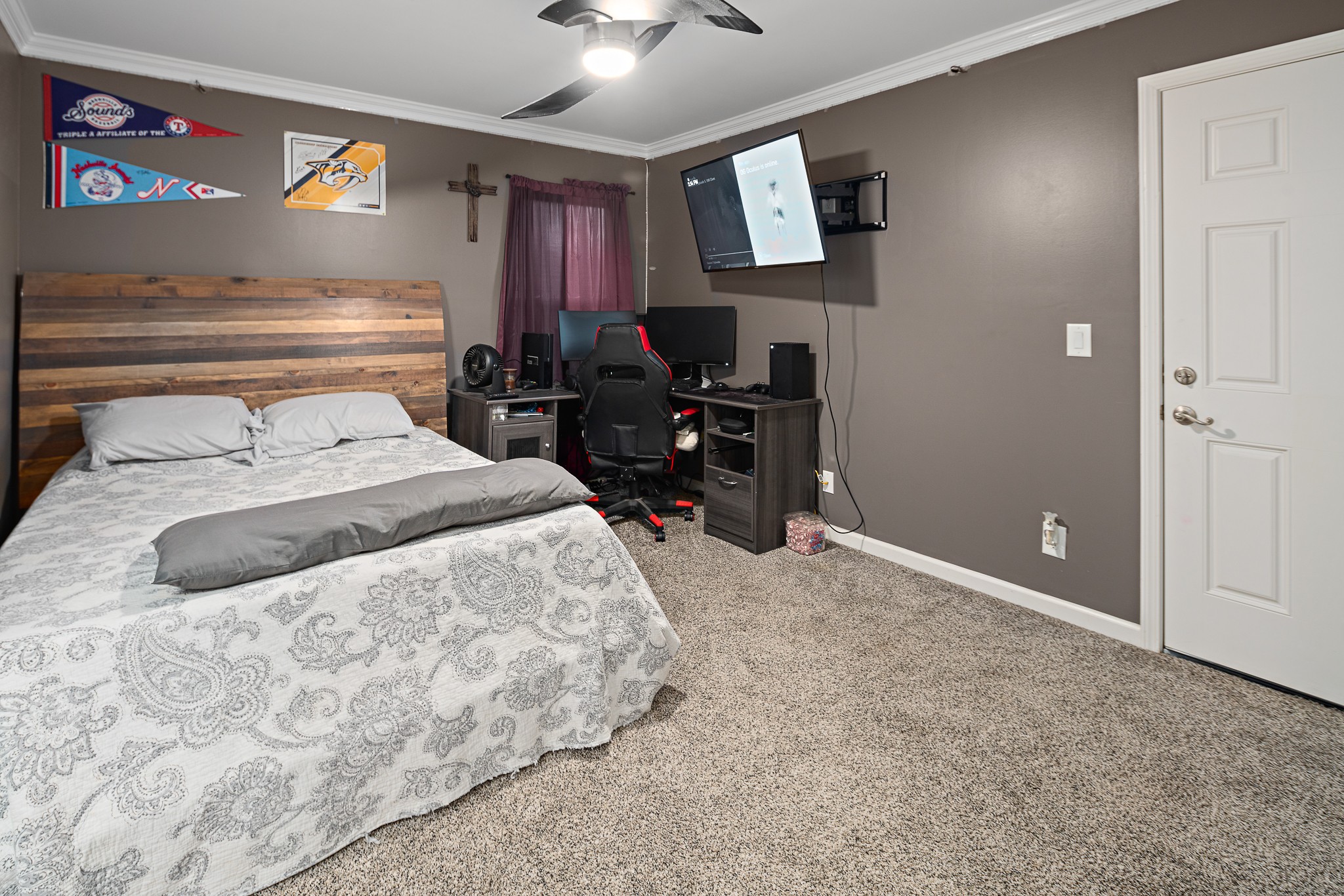 13577 Versailles Road Rockvale, TN 37153 - Photo 27 of 50 a bedroom with a bed and a flat screen tv