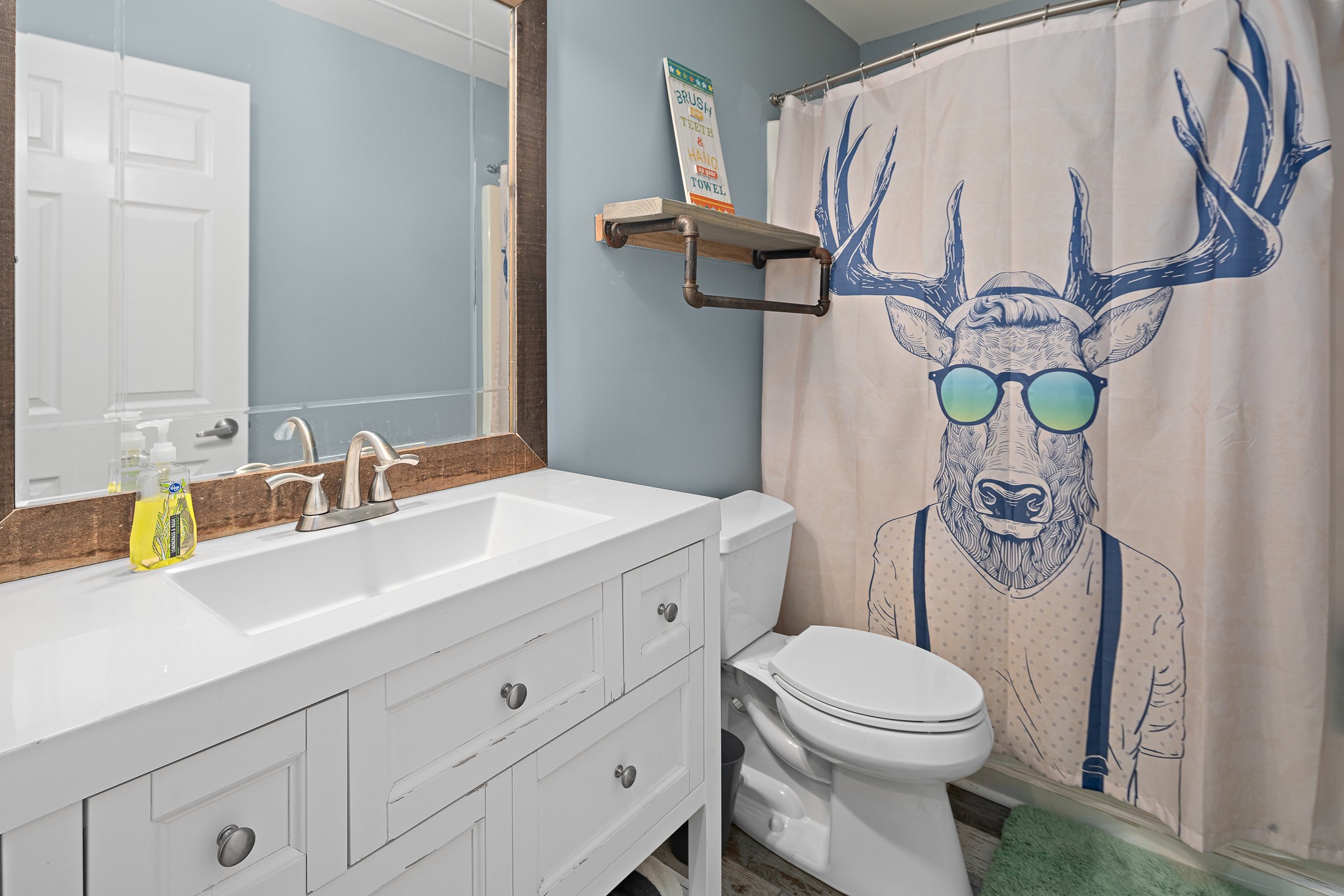 13577 Versailles Road Rockvale, TN 37153 - Photo 32 of 50 a bathroom with a sink a toilet and a mirror