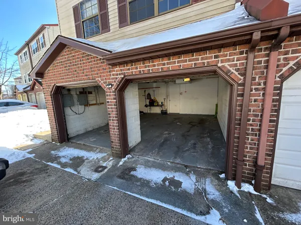 a front view of a house with a garage
