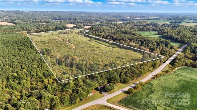 a view of a balcony with an outdoor seating