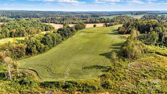a view of a swimming pool with a lake view