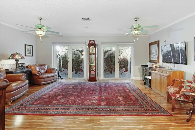 a living room with furniture fireplace and flat screen tv