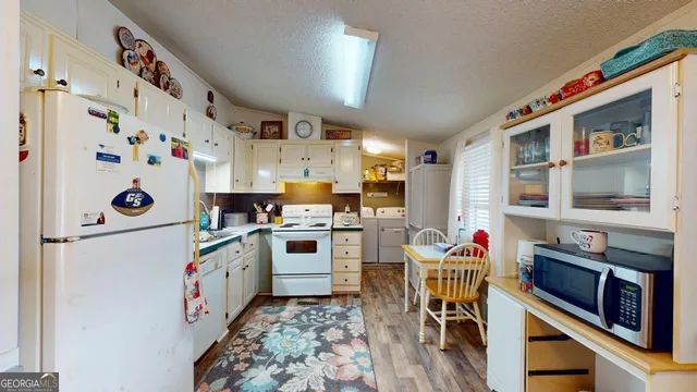 a storage room with washer and dryer