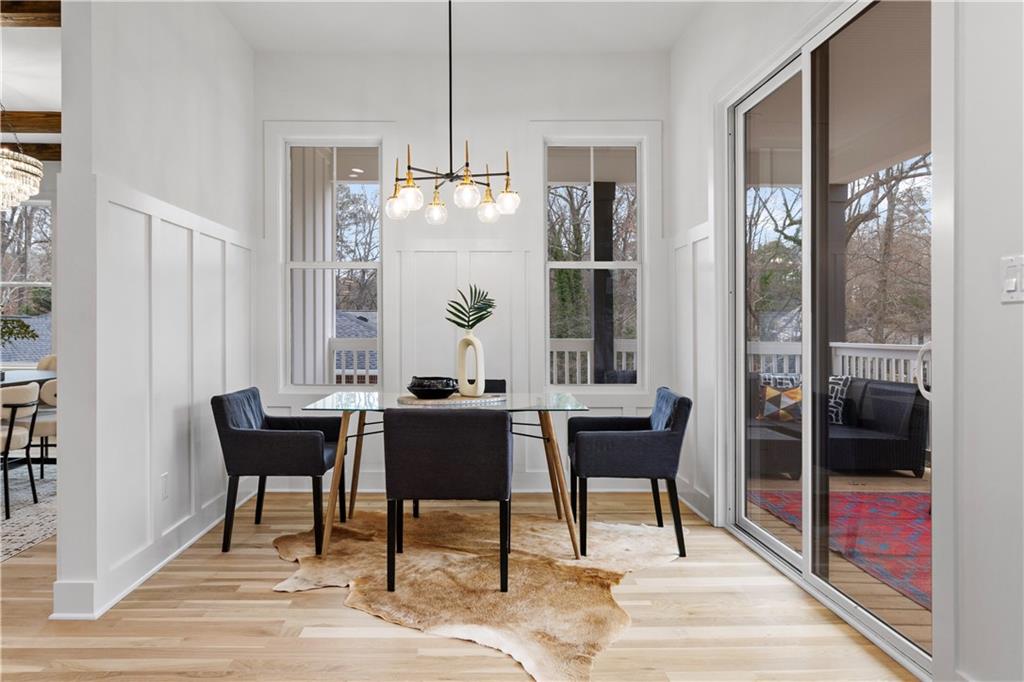 515 Chevelle Lane Decatur, GA 30030 - Photo 15 of 39 a view of a dining room with furniture window and wooden floor