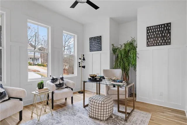 a living room with furniture and a window
