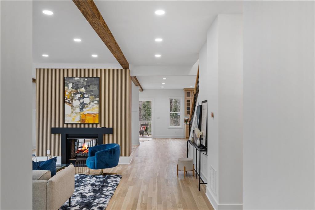 515 Chevelle Lane Decatur, GA 30030 - Photo 6 of 39 a living room with furniture and a flat screen tv