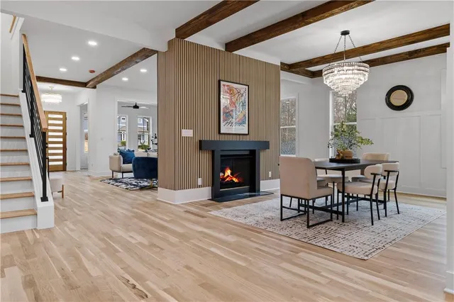 a view of a livingroom with furniture and a fireplace