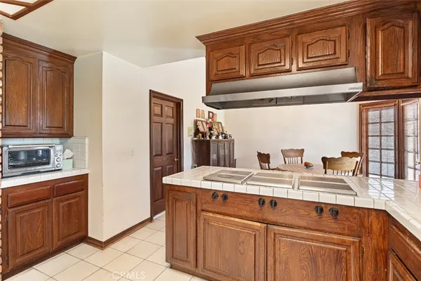 a kitchen with stainless steel appliances granite countertop a sink and dishwasher