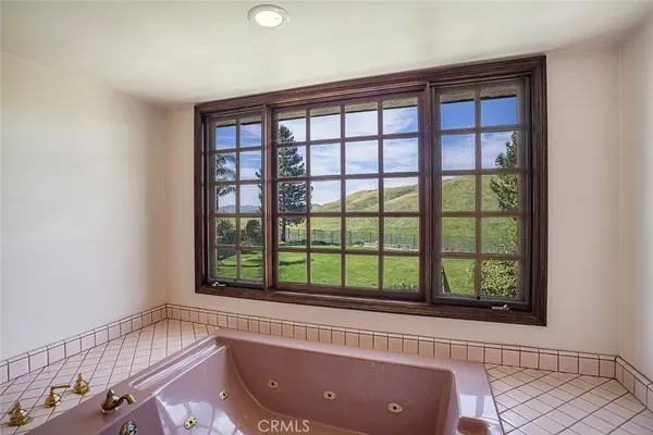 a view of a living room and a window