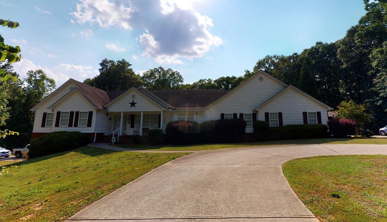 244 Pierce Road Winder, GA 30680 - Photo 1 of 1 a front view of a house with a yard