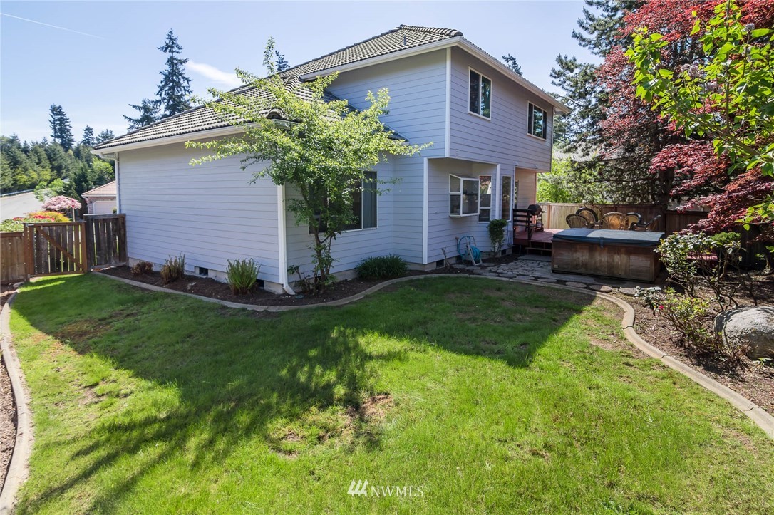 36907 17th Avenue South Federal Way, WA 98003 - Photo 23 of 25 a front view of a house with a garden