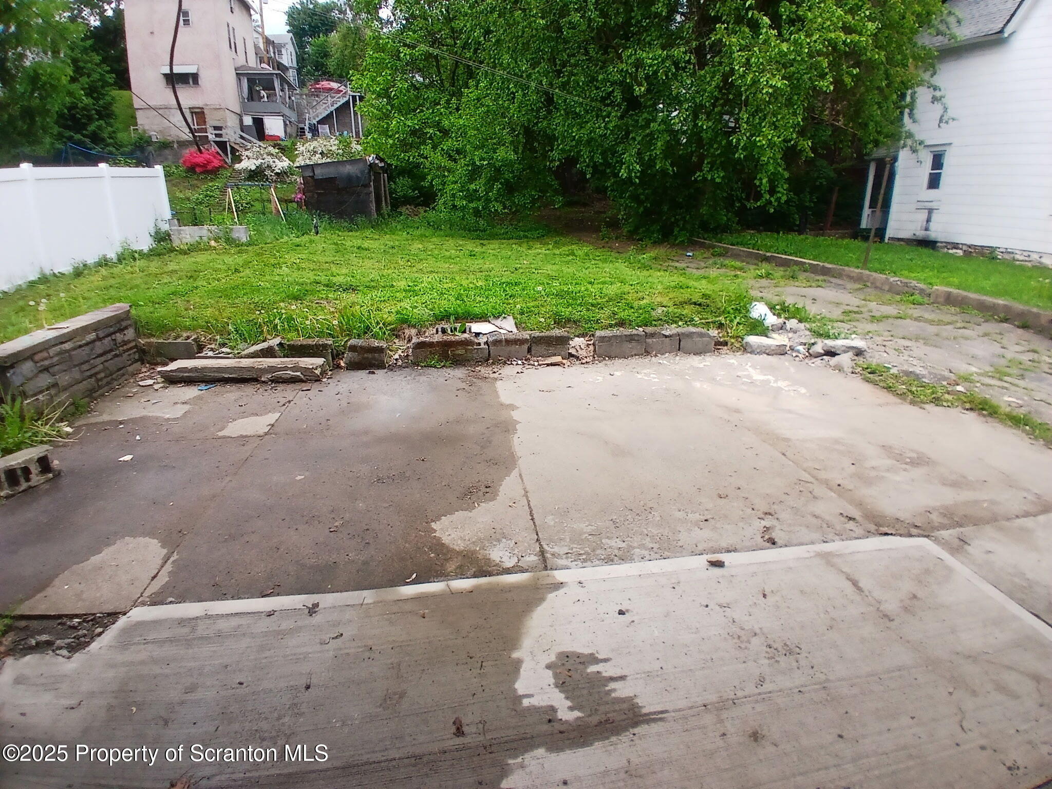 1729 Church Avenue, Unit 1 Scranton, PA 18508 - Photo 8 of 8 a backyard of a house with yard and green space