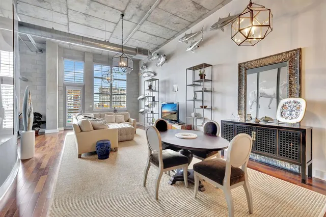 a kitchen with stainless steel appliances granite countertop a stove and cabinets