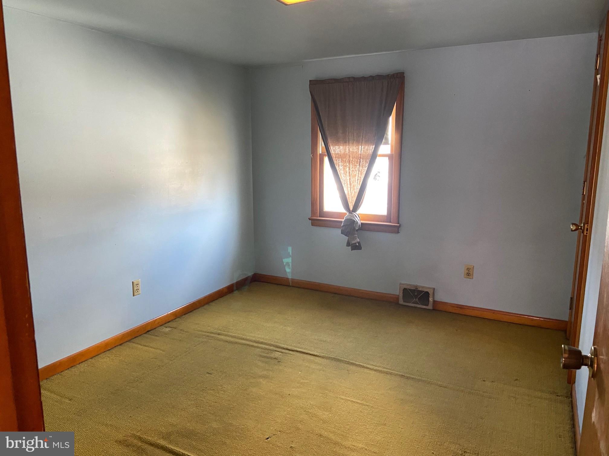 74 South Broadway Pennsville, NJ 08070 - Photo 16 of 22 an empty room with a window