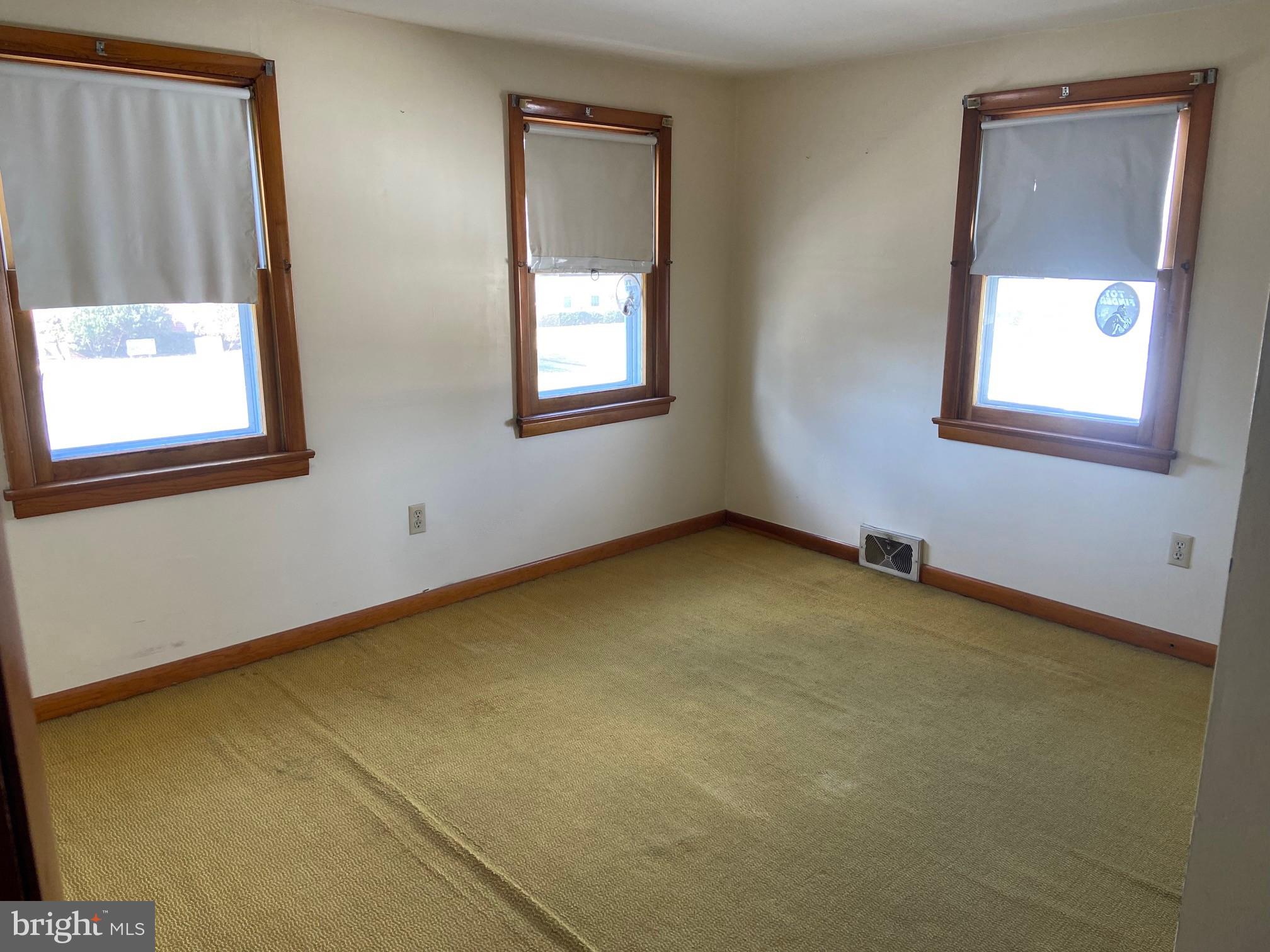 74 South Broadway Pennsville, NJ 08070 - Photo 18 of 22 a view of an empty room with a window